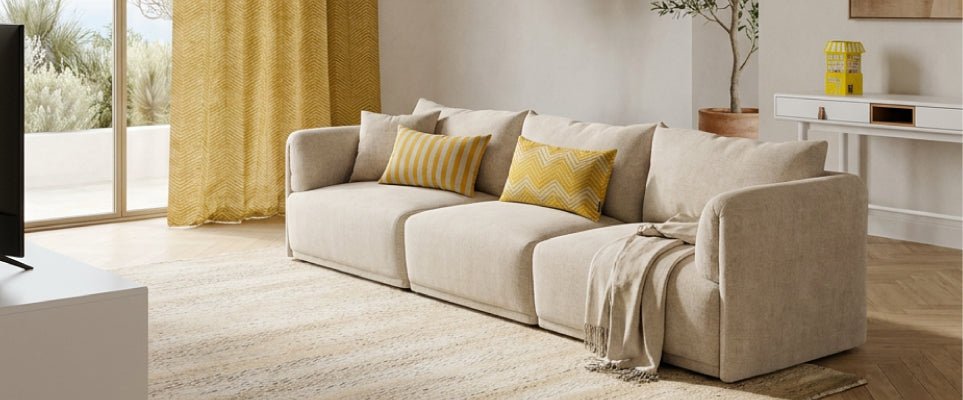 Como combinar almofadas e mantas: guia para uma sala elegante - Gato Preto