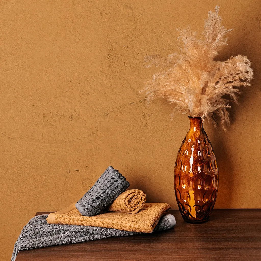 Como escolher a toalha de banho perfeita - Gato Preto