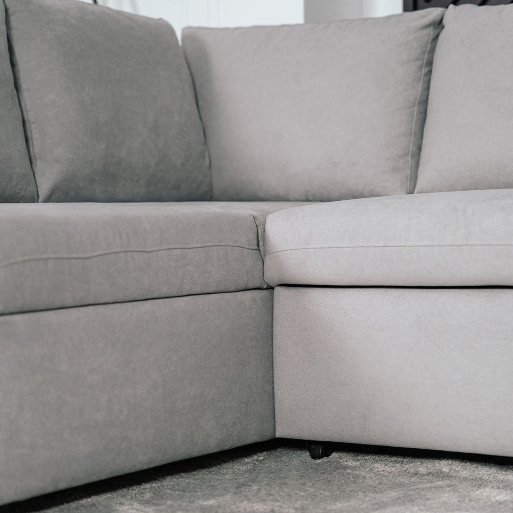 Sofá cama de canto de com puff e arrumação cinza ZURIE - Gato Preto