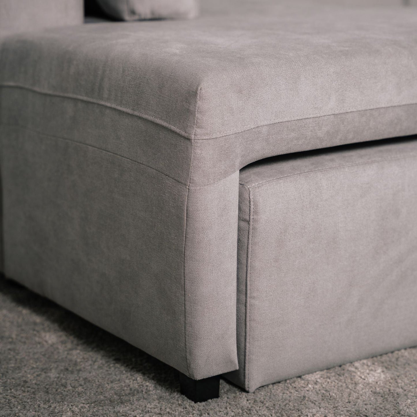Sofá cama de canto de com puff e arrumação cinza ZURIE - Gato Preto