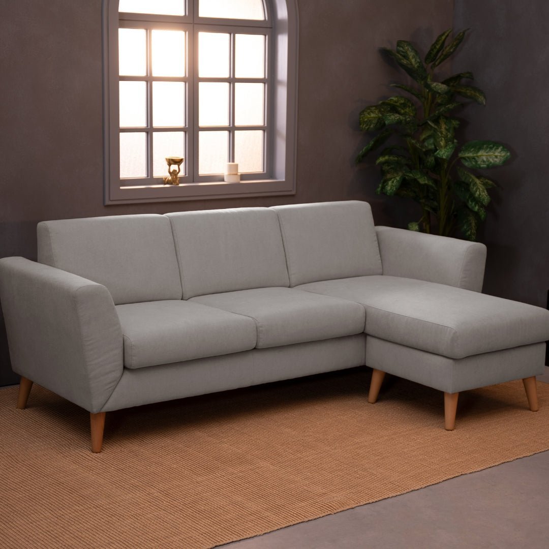 Sofá com chaise longue reversível e pés vintage cinza ANGEL - Gato Preto