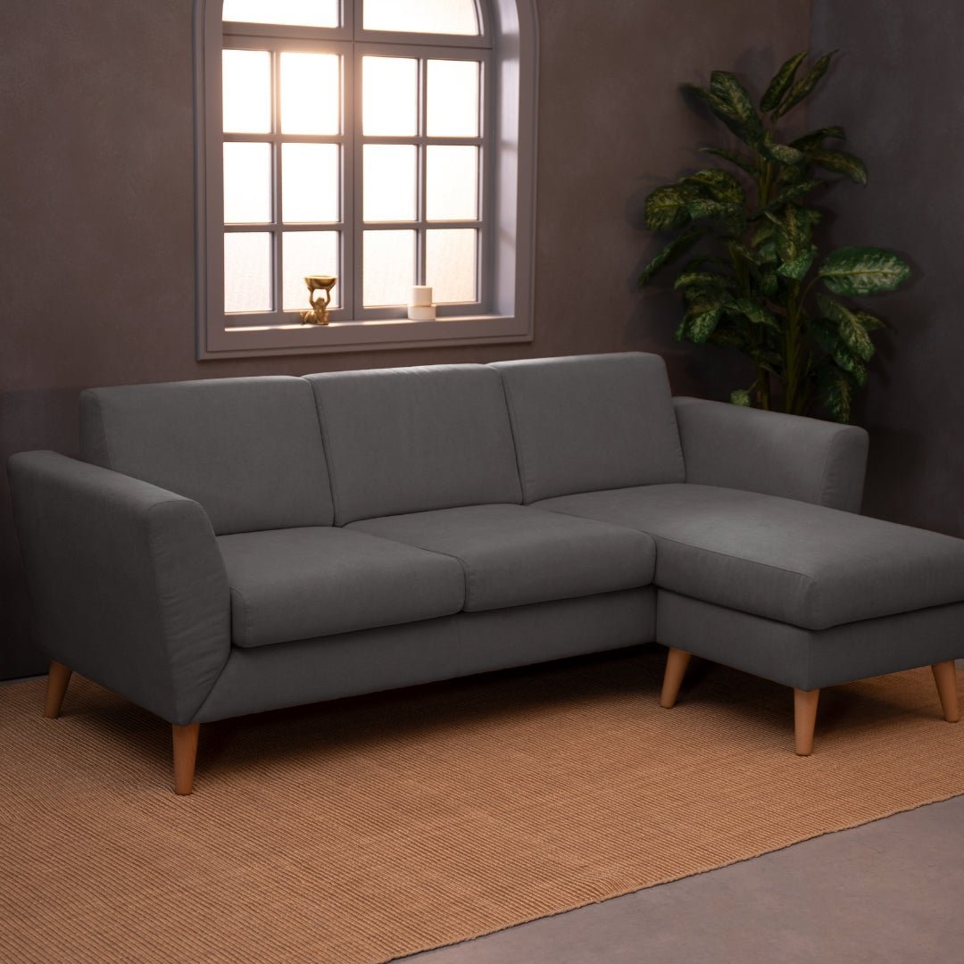 Sofá com chaise longue reversível e pés vintage cinza escuro ANGEL - Gato Preto