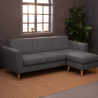 Sofá com chaise longue reversível e pés vintage cinza escuro ANGEL - Gato Preto